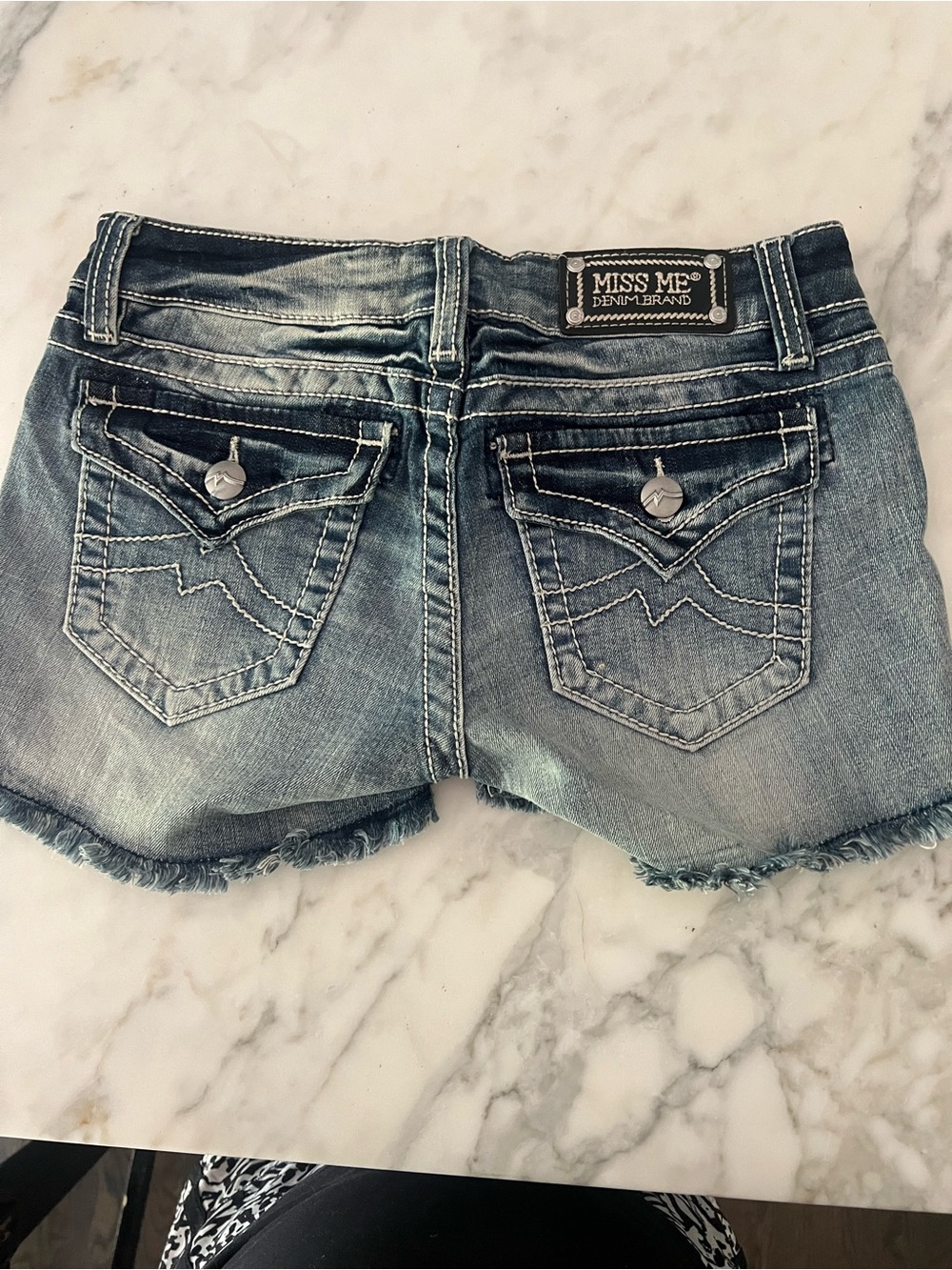 Miss Me Women's Light Blue Distressed Denim Shorts with Flap Pockets